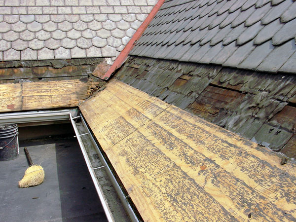 One Way To Install Standing Seam Copper Snow Aprons on a Slate Roof