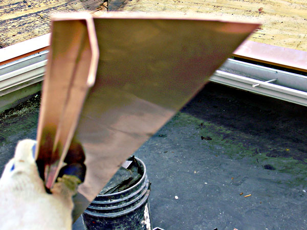 One Way To Install Standing Seam Copper Snow Aprons on a Slate Roof
