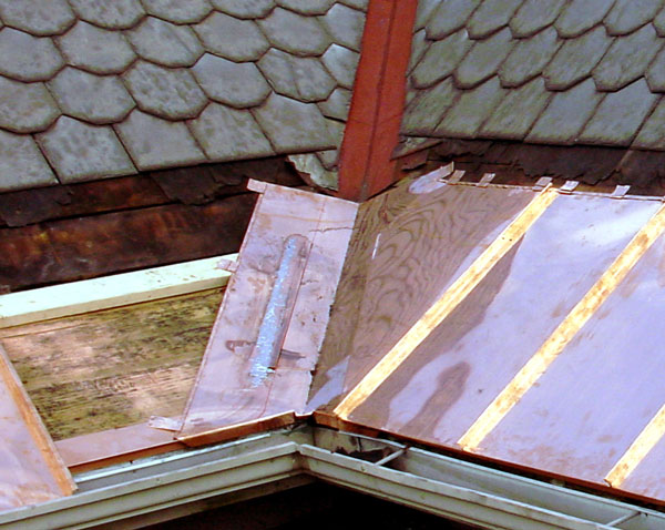 One Way To Install Standing Seam Copper Snow Aprons on a Slate Roof