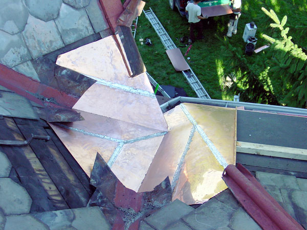 One Way To Install Standing Seam Copper Snow Aprons on a Slate Roof